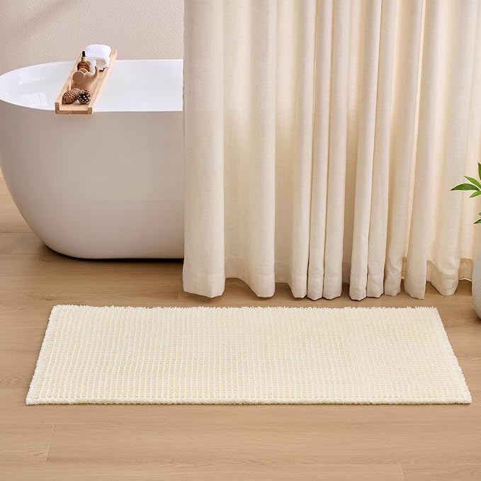 ILANGO Upgraded Waffle Bathroom Rugs,Super Absorbent Boho Non Slip Runner Bathroom Mats Quick Dry,Ultra Soft Machine Washable Mat with Tassels for Hallway,24x48,Cream White