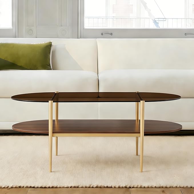 Shrine Oval Coffee Table, Mid-Century Modern Design, 2-Tier Structure, Amber Glass Top and Walnut MDF Shelf, 47" D x 21" W x 17" H, Sleek Conical Metal Legs with Gold Finish
