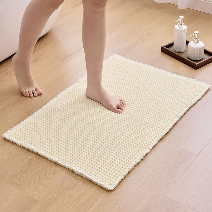ILANGO Upgraded Waffle Bath Mat,Super Absorbent Boho Non Slip Bathroom Rugs Quick Dry,Ultra Soft Machine Washable Mats with Tassels for Floor,20x32,Cream White