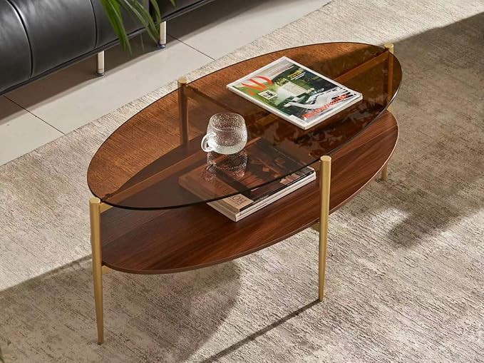 Shrine Oval Coffee Table, Mid-Century Modern Design, 2-Tier Structure, Amber Glass Top and Walnut MDF Shelf, 47" D x 21" W x 17" H, Sleek Conical Metal Legs with Gold Finish